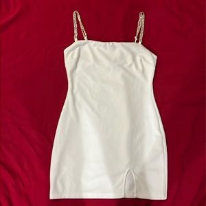 White bodycon mini dress with split
